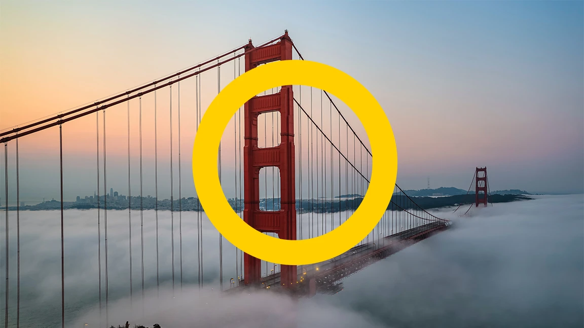 mindcurv group logo superimposed over the golden gate bridge in the mist
